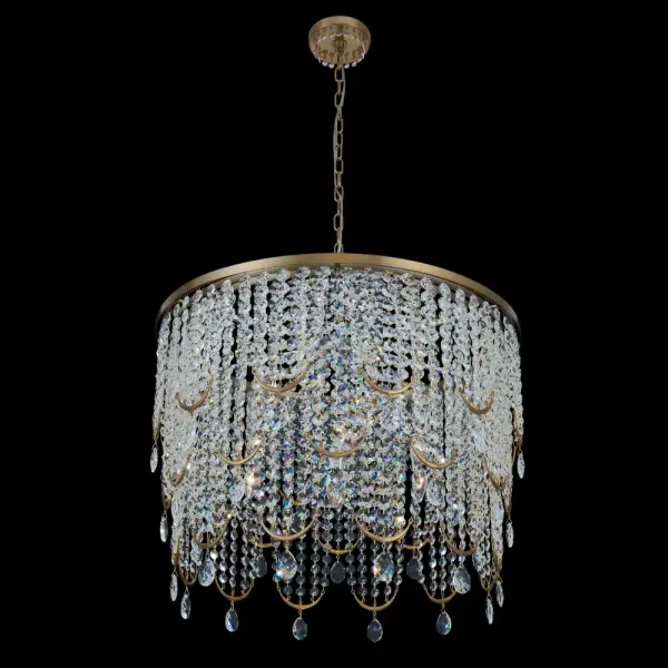 The Vezzo pendant combines bohemian-inspired design with sophisticated crystal craftsmanship. Graduated Firenze octagon crystals create soft, layered patterns around brushed champagne gold brass hardware, delivering dramatic visual impact.