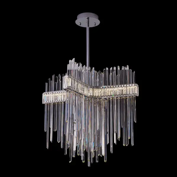 The Piovere 36" pendant is a show-stopping light sculpture featuring hexagonal solid crystal rods suspended between mirror-polished stainless steel plates. Its futuristic design and random crystal curtains create unparalleled visual drama.