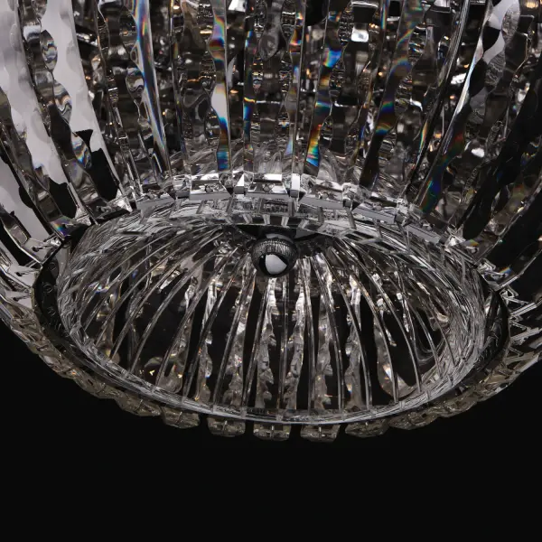 The Fontana pendant is a show-stopping 61-inch crystal chandelier inspired by water's natural fluidity. Its meticulously cut crystals create captivating organic forms, while the polished chrome finish adds contemporary elegance. - alternate view