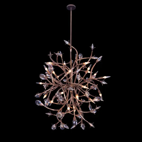 The Fiore 34" pendant showcases large faceted crystals arranged on flowing branch-like arms, creating an organic sculpture that balances artistry with function. The matte white finish offers a fresh, contemporary take on crystal lighting.