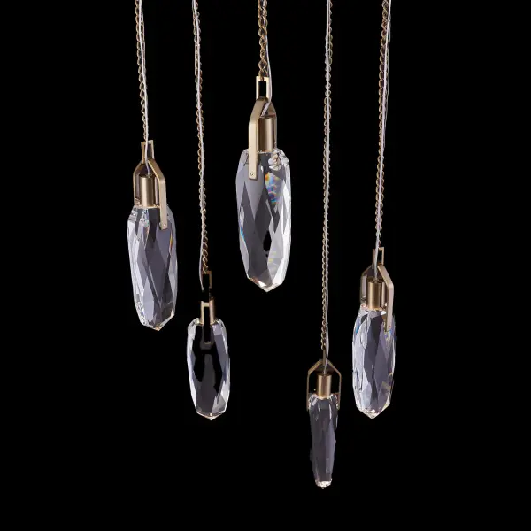 The Diamante 5-Light Drop Pendant combines contemporary sophistication with luxurious crystal craftsmanship. Featuring chunky faceted crystals suspended from an ornate chain in Winter Brass finish, this fixture delivers 1400 lumens of warm 3000K LED light with exceptional 90 CRI color rendering. - alternate view