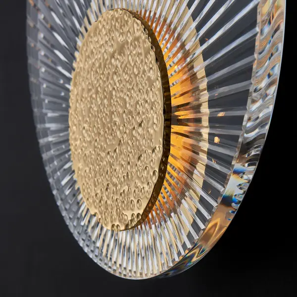 The Girare LED Wall Sconce combines Art Deco elegance with modern LED technology. Featuring intricately cut crystals and a hammered 18K gold brass plate, it creates a stunning halo effect while maintaining a low-profile, ADA-compliant design. - alternate view