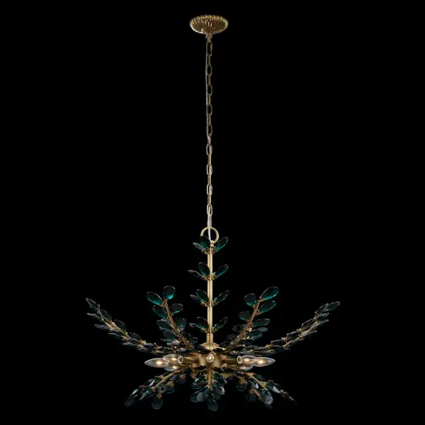 The Alloro pendant brings botanical beauty to life with emerald Firenze crystals cascading like elegant vines. At 32 inches wide, this statement piece combines romantic design with sophisticated brass craftsmanship for spaces that deserve extraordinary lighting.