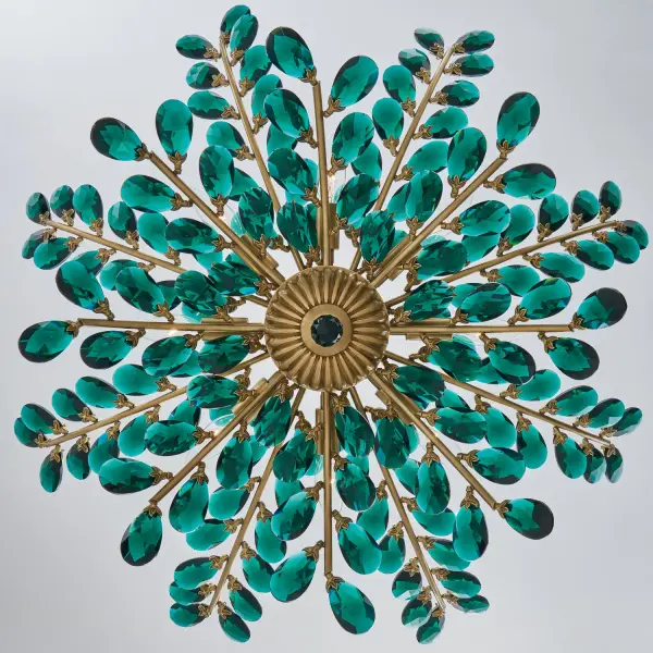 The Alloro pendant brings botanical beauty to life with emerald Firenze crystals cascading like elegant vines. At 32 inches wide, this statement piece combines romantic design with sophisticated brass craftsmanship for spaces that deserve extraordinary lighting. - alternate view