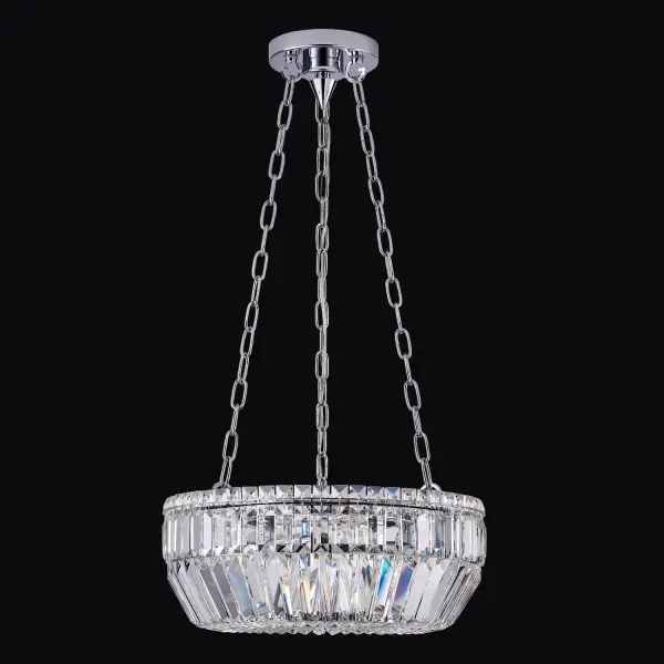 The Circolare pendant combines modern minimalism with classic crystal elegance. Its 19-inch ring design features polished chrome and crystal construction, creating sophisticated sparkle perfect for intimate dining spaces.
