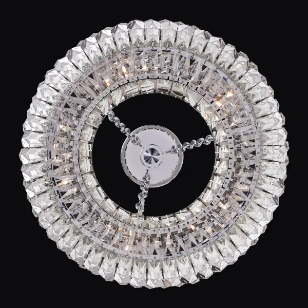 The Circolare pendant combines modern minimalism with classic crystal elegance. Its 19-inch ring design features polished chrome and crystal construction, creating sophisticated sparkle perfect for intimate dining spaces. - alternate view