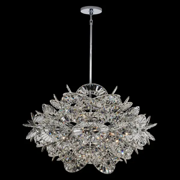The Luminoso chandelier combines architectural geometry with sparkling crystal elegance. Its layered crystal arches create a bold, jewelry-like statement while the polished chrome finish adds contemporary sophistication. Perfect for grand spaces.