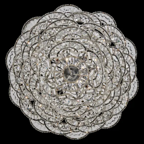 The Luminoso chandelier combines architectural geometry with sparkling crystal elegance. Its layered crystal arches create a bold, jewelry-like statement while the polished chrome finish adds contemporary sophistication. Perfect for grand spaces. - alternate view