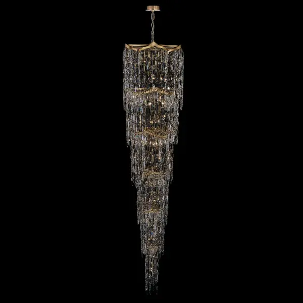 The Cadere Foyer Light transforms grand entryways with cascading Firenze Crystals suspended from an undulating 18K gold frame. At 26" wide and 110" tall, this dramatic fixture creates mesmerizing visual texture inspired by waterfalls.