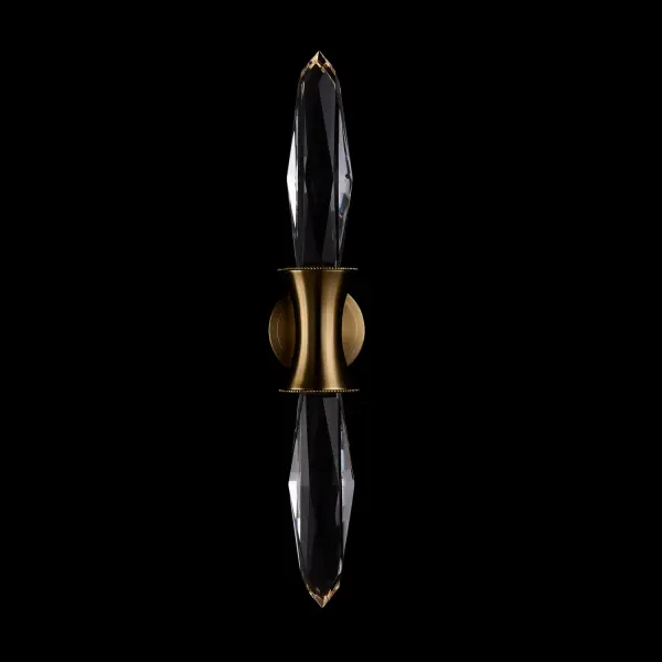 The Mostra LED Wall Sconce transforms any space with its museum pedestal-inspired design, featuring luminous crystal that glows like a cherished artifact. Perfect for adding refined sophistication to powder rooms and closets.