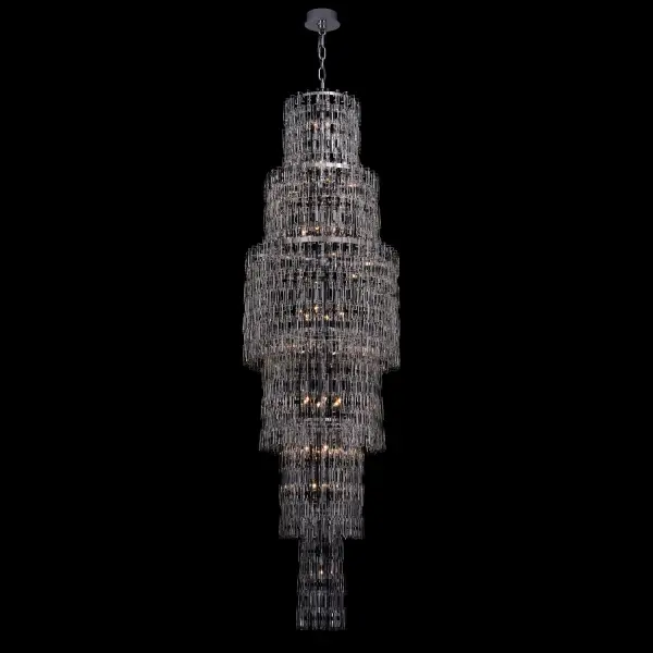 The Catene creates a dramatic waterfall effect with geometric crystal links cascading nearly 8 feet. Its polished chrome finish and substantial 27-inch diameter make it ideal for grand entryways and high-ceiling spaces requiring bold visual impact.