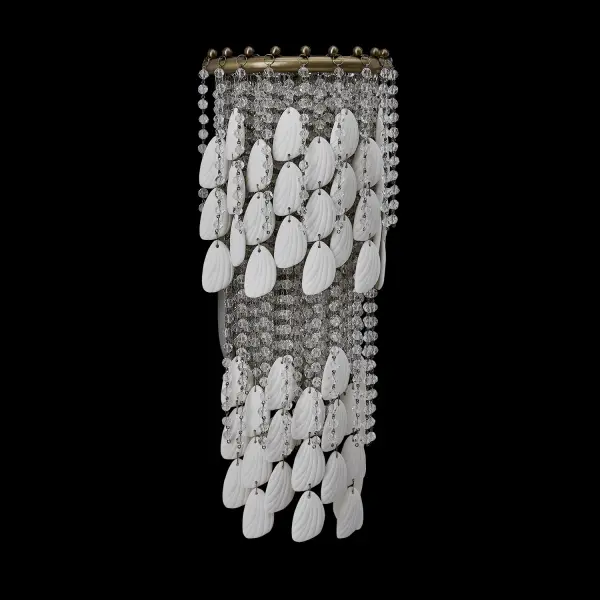 The Farfalle wall sconce brings sophisticated boho elegance with sparkling Firenze crystals and bone china accents that create a butterfly wing effect. The moving crystal strands add dynamic light play and texture.