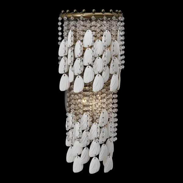 The Farfalle wall sconce brings sophisticated boho elegance with sparkling Firenze crystals and bone china accents that create a butterfly wing effect. The moving crystal strands add dynamic light play and texture. - alternate view