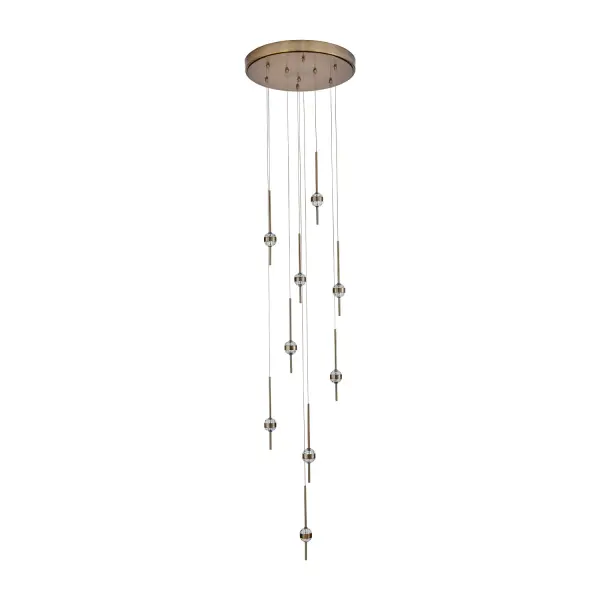 The Goccia chandelier transforms any space with its jewelry-inspired design, featuring oversized luxurious crystals pierced by a Winter Brass frame. Integrated LED lighting creates brilliant sparkle and ambiance. - alternate view