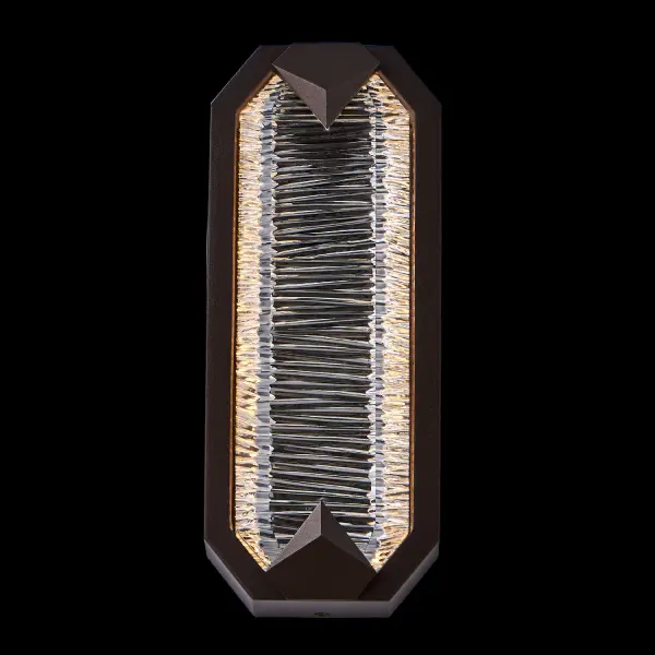 The Carato wall sconce combines modern sophistication with outdoor durability. Diamond-cut crystal with horizontal facets creates stunning light refraction, while fluorocarbon bronze finish withstands harsh weather. Perfect for adding sparkle to entryways and patios.
