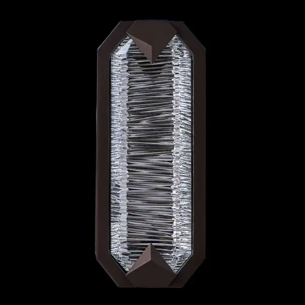 The Carato wall sconce combines modern sophistication with outdoor durability. Diamond-cut crystal with horizontal facets creates stunning light refraction, while fluorocarbon bronze finish withstands harsh weather. Perfect for adding sparkle to entryways and patios. - alternate view