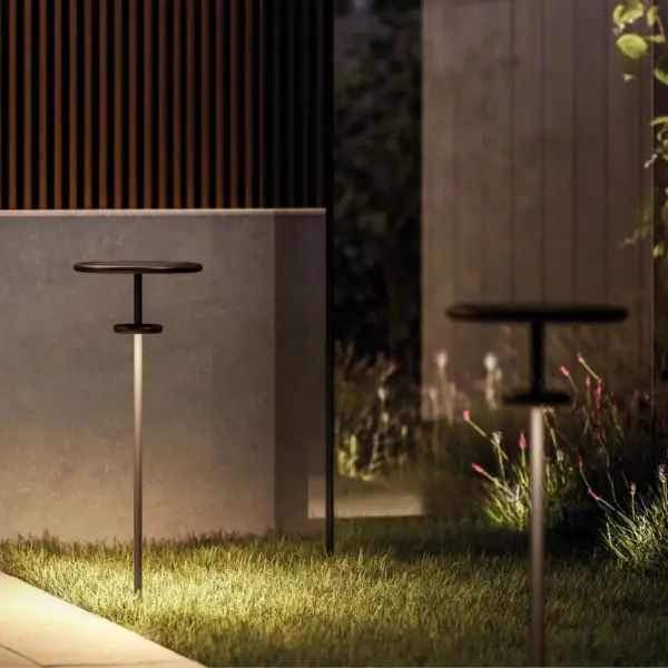 The Planet B combines eco-friendly solar technology with contemporary design. Features adjustable height options, automatic daylight sensing, and IP65 weatherproofing for reliable outdoor illumination without electrical connections.