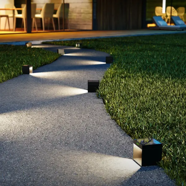 The Alea Side combines sustainable solar technology with contemporary design. This compact 5.7" cube lamp features automatic daylight sensing, IP65 weather resistance, and 13-15 hours of cordless illumination per charge.