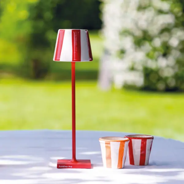 The Poldina Pro Micro Lido combines Italian artisan ceramic with modern cordless convenience. Its compact 10.8-inch height, full-range dimming, and IP65 rating make it perfect for indoor and outdoor use with 6-7 hours of runtime. - alternate view