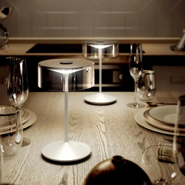 The Crystal cordless table lamp combines modern design with practical portability. Featuring touch-dimming LED technology and IP54 weather resistance, it delivers up to 11 hours of illumination per charge, making it perfect for indoor and outdoor use. - alternate view