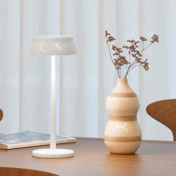 The Sister Light Wi-Fi combines modern portability with smart technology. This rechargeable LED lamp offers up to 36 hours of illumination, app-based control, and tunable color temperature. Perfect for indoor and outdoor use. - alternate view