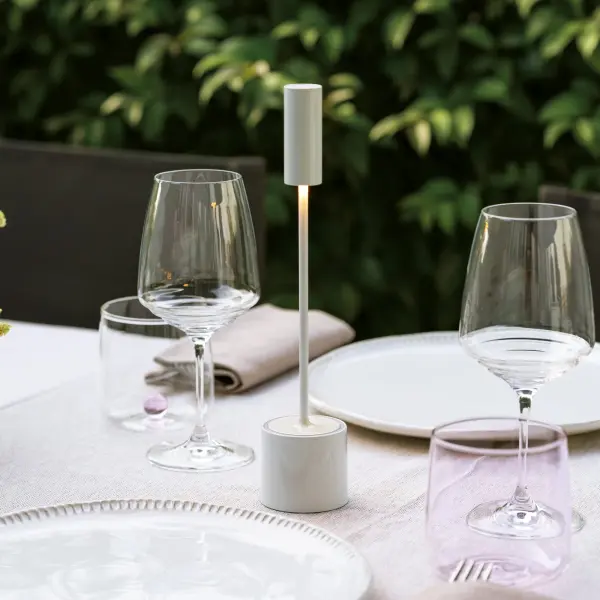 The Carolina Pro combines contemporary design with practical cordless functionality. Features touch-controlled dimming, three color temperatures (2200K-3000K), and up to 9 hours of battery life. Perfect for creating ambiance anywhere without cables. - alternate view