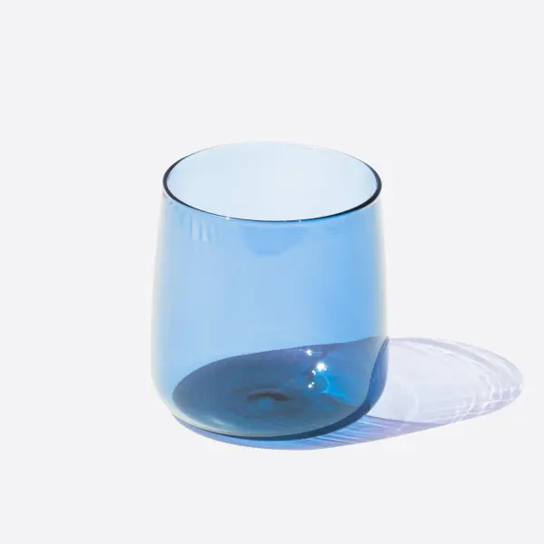 The No Bilia Tumbler set combines Italian design elegance with everyday durability. These colored glass tumblers are ideal for iced drinks and casual dining, offering a sophisticated pop of color without fragile elements. - alternate view