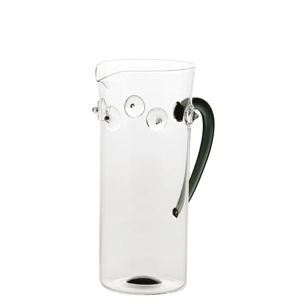 This elegant white borosilicate glass carafe brings Mediterranean charm to any table with hand-crafted embossed patterns inspired by coastal mollusks. Combining beauty with durability, it's thermal shock resistant and safe for dishwasher and microwave use. - alternate view