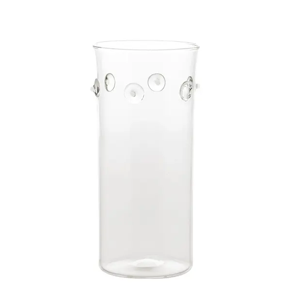 The Patéa vase brings coastal elegance indoors with its borosilicate glass construction featuring delicate marine-inspired decorations. Colorful spots and organic shapes evoke Mediterranean shores while offering practical benefits.