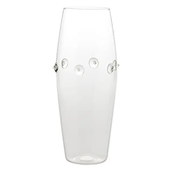 The Patéa Tall Convex Vase brings sophisticated coastal charm to any space with its handcrafted borosilicate glass construction and mollusk-inspired design. Featuring colorful spots and refined shapes, this practical yet elegant piece is thermal shock resistant, dishwasher safe, and microwave-friendly.