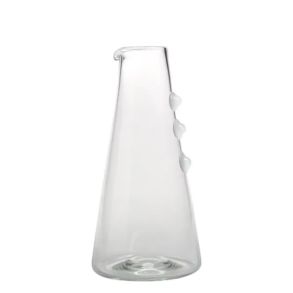 The Petoni carafe combines artisanal Italian craftsmanship with practical design. Made from thermal-shock resistant borosilicate glass with decorative reliefs for secure grip, it transitions seamlessly from casual meals to special occasions.