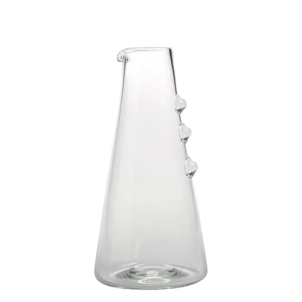 The Petoni carafe combines artisanal Italian craftsmanship with practical design. Made from thermal-shock resistant borosilicate glass with decorative reliefs for secure grip, it transitions seamlessly from casual meals to special occasions. - alternate view