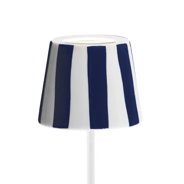 The Poldina Lido Shade brings bold Italian Riviera style to your cordless lamp with handmade ceramic craftsmanship. Each shade features vibrant striped patterns inspired by coastal cabanas, handcrafted by artisans near Rome.