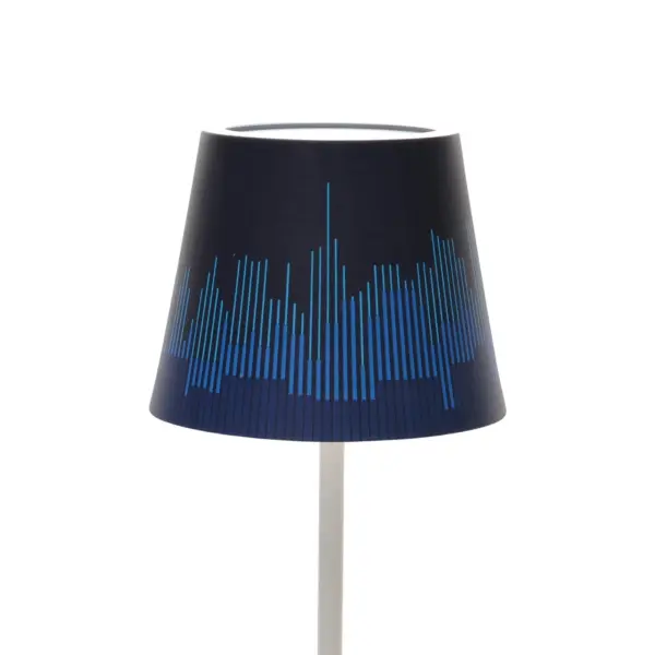 Exclusive designer shade by NYC-based Kickie Chudikova brings Art Deco elegance to Poldina cordless lamps. Features graphic skyline pattern inspired by the Chrysler Building in sophisticated Steel Blue finish.