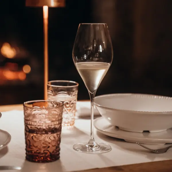 This set of two VEM wine glasses combines sophisticated design with practical functionality. At 10.8oz capacity and 9.7" height, they're ideally proportioned for sparkling and white wines. Dishwasher safe for easy care. - alternate view