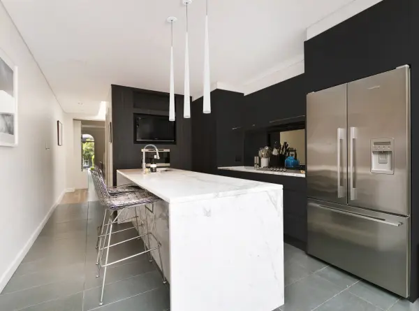 The Mina 24-inch pendant combines contemporary design with energy-efficient LED technology. Its conical shape and clear acrylic diffuser provide excellent light distribution while the clean white finish complements modern interiors. - alternate view