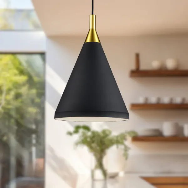 The Dorothy pendant combines clean modern lines with sophisticated gold detailing. Its 10-inch conical aluminum shade delivers focused downlight perfect for task areas or intimate spaces. The cloth cable suspension adds textural interest. - alternate view