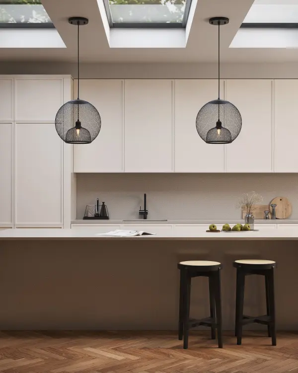 The Gibraltar pendant combines contemporary design with industrial edge through its spherical wire mesh shade. The black exterior with gold interior creates dramatic visual interest while providing warm ambient glow. - alternate view