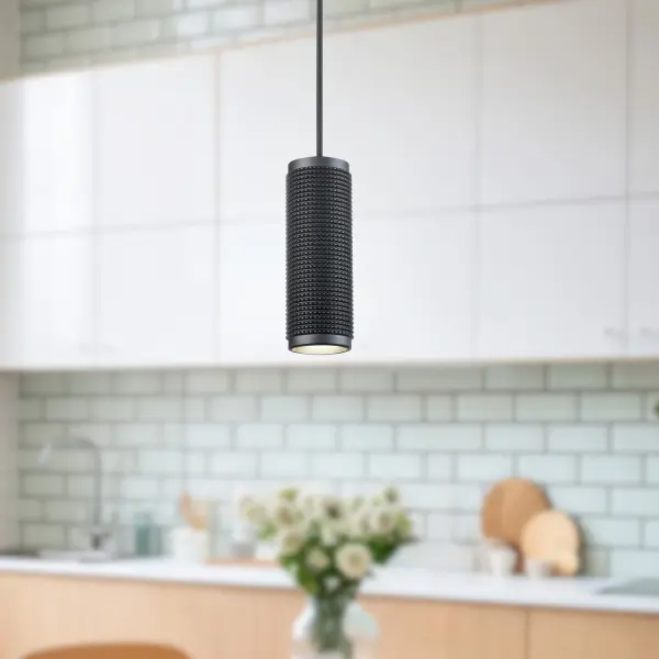 The Micro 3-inch pendant delivers striking visual impact in a compact form. Its oversized knurled pattern creates dramatic texture on the aluminum shade, while the black finish with contrasting interior adds depth and sophistication. - alternate view