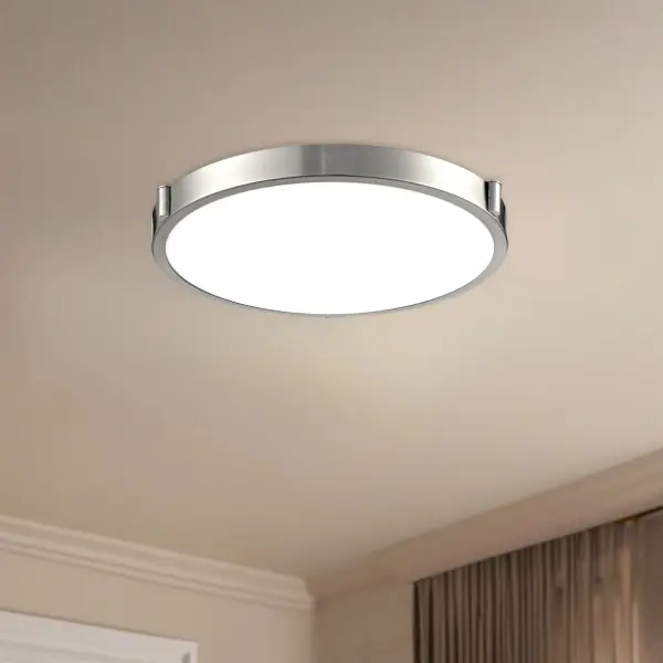 The Floyd 11-inch flush mount combines brushed gold and nickel finishes with white opal glass for a contemporary look. Integrated 3000K LED provides warm, energy-efficient lighting ideal for smaller spaces. - alternate view