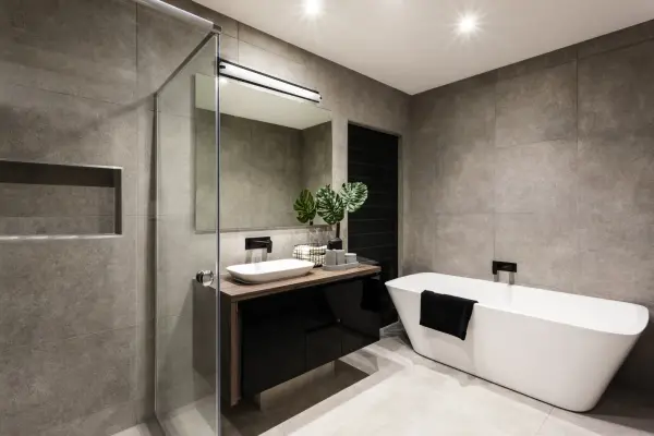 The Lighthouse vanity light combines contemporary design with practical functionality. Featuring white opal glass cylinders and frosted side covers, this 38-inch fixture delivers warm 3000K LED illumination perfect for bathroom tasks. - alternate view