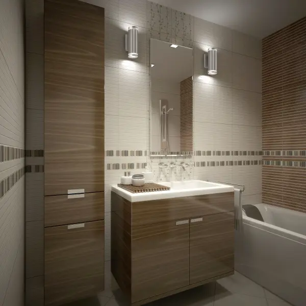 The Norfolk wall sconce delivers contemporary style with its clean cylinder form and glass disc accents. Integrated 3000K LED provides warm, energy-efficient lighting in an up/down configuration perfect for ambient illumination. - alternate view