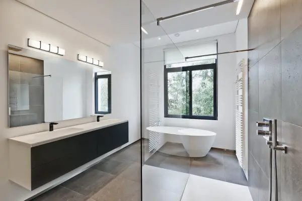 The Watford 35-inch vanity light combines contemporary design with practical functionality. Features energy-efficient integrated LED technology, frosted glass with decorative clear edges, and polished chrome accents. Can be mounted horizontally or vertically to suit your space. - alternate view