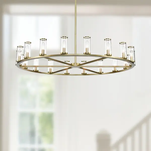 The Revolve 48-inch chandelier combines vintage candle-holder elegance with modern sophistication. Clear glass tubes accented with metal rings create a striking focal point perfect for formal dining rooms and grand entryways. - alternate view