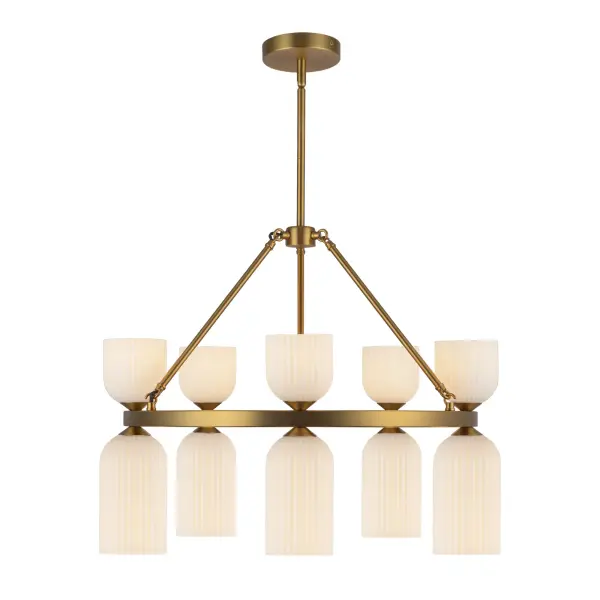 The Nelly chandelier combines timeless ribbed glass shades with contemporary asymmetrical forms, creating a versatile fixture that bridges traditional and modern aesthetics. The brushed gold finish and opal glass provide warm, diffused lighting.