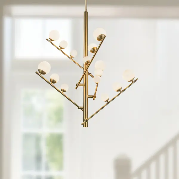 The Cypress chandelier features innovative adjustable arms that expand or contract to fit your space perfectly. With 15 matte opal glass globes and integrated LED lighting, it delivers both style and functionality. - alternate view