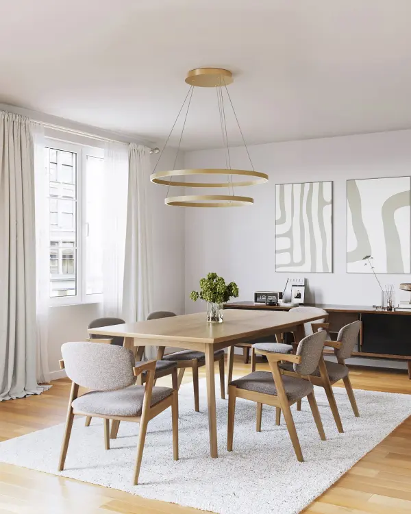 The Cerchio 32-inch chandelier features a sophisticated two-tier design with extruded aluminum rings and integrated LED lighting. Its brushed gold finish and clean geometric profile create a stunning focal point for contemporary interiors. - alternate view