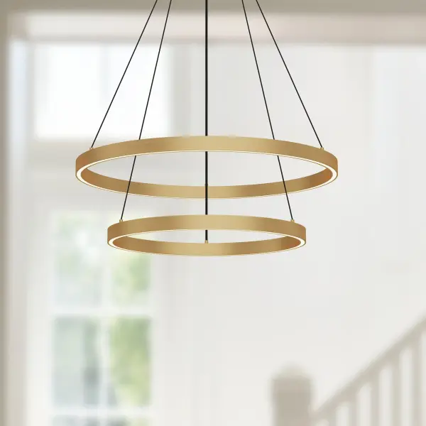 The Cerchio chandelier features a distinctive two-tier circular design with extruded aluminum construction and up/down lighting. Its 24-inch diameter and integrated 3000K LED make it perfect for modern dining rooms and living spaces. - alternate view