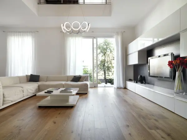 The Oros chandelier features die-cast aluminum rings with translucent acrylic diffusers that create a stunning sculptural presence. Integrated 3000K LED provides warm, outward-emitting light perfect for ambient illumination in contemporary spaces. - alternate view