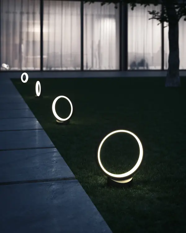 The Parc collection brings contemporary design to outdoor lighting with circular frames of illumination. Perfect for lining walkways or creating statement installations with integrated LED technology. - alternate view